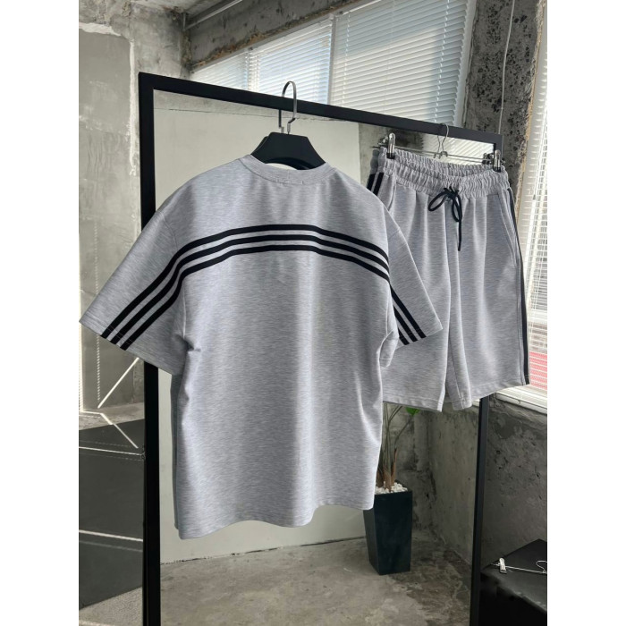 Oversize костюм з акцентними смужками