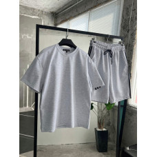 Oversize костюм з акцентними смужками