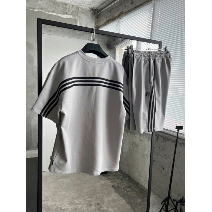 Oversize костюм з акцентними смужками