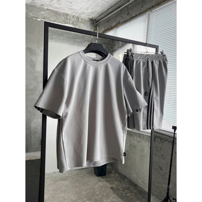 Oversize костюм з акцентними смужками