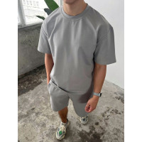 Oversize костюм з акцентними смужками