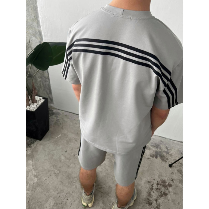 Oversize костюм з акцентними смужками