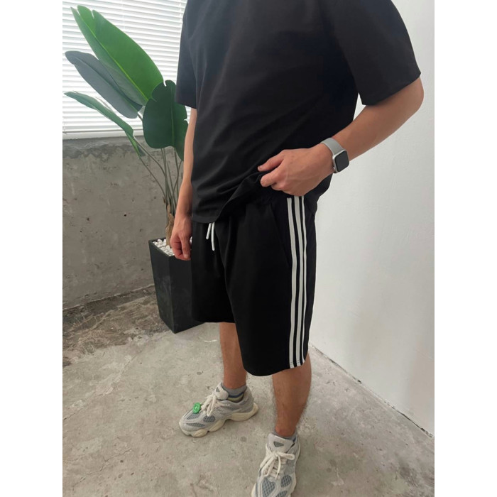 Oversize костюм з акцентними смужками