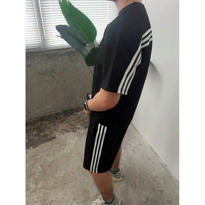 Oversize костюм з акцентними смужками