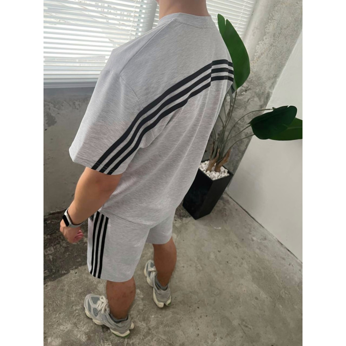 Oversize костюм з акцентними смужками