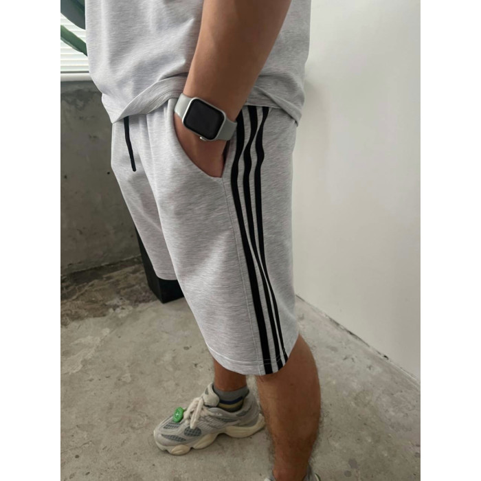 Oversize костюм з акцентними смужками