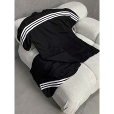 Oversize костюм з акцентними смужками