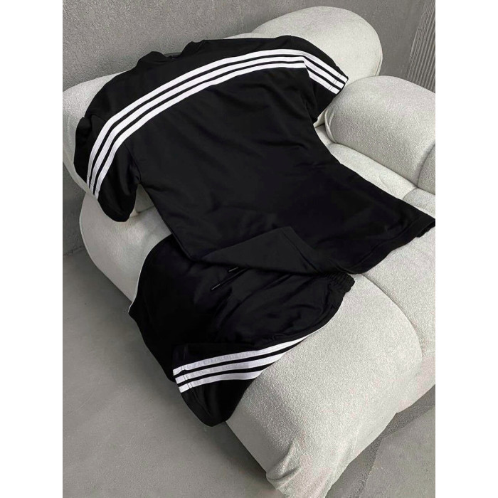 Oversize костюм з акцентними смужками