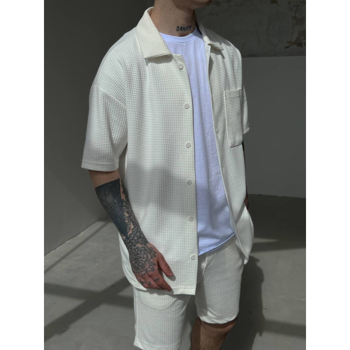 Oversize костюм з фактурної тканини