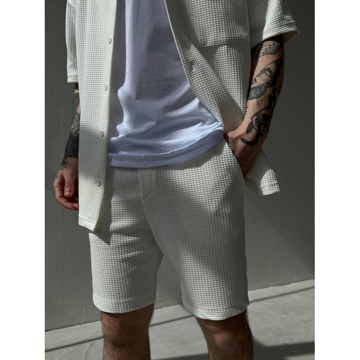 Oversize костюм з фактурної тканини