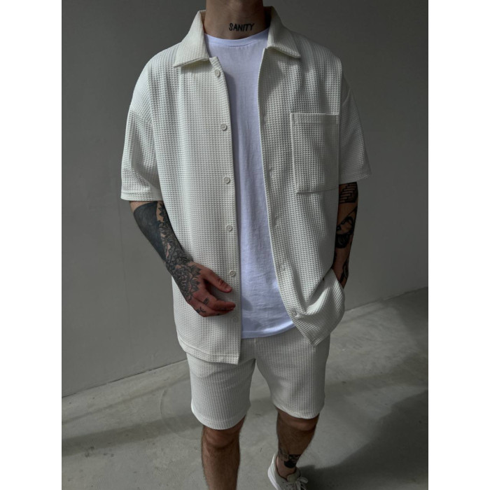 Oversize костюм з фактурної тканини