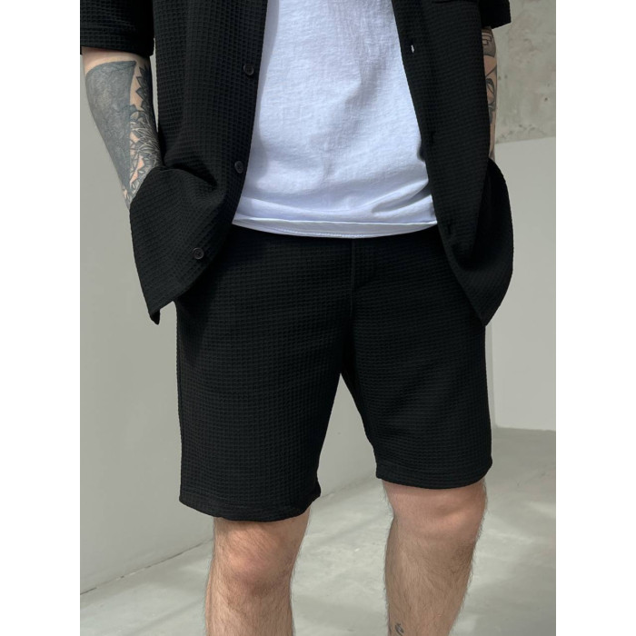 Oversize костюм з фактурної тканини