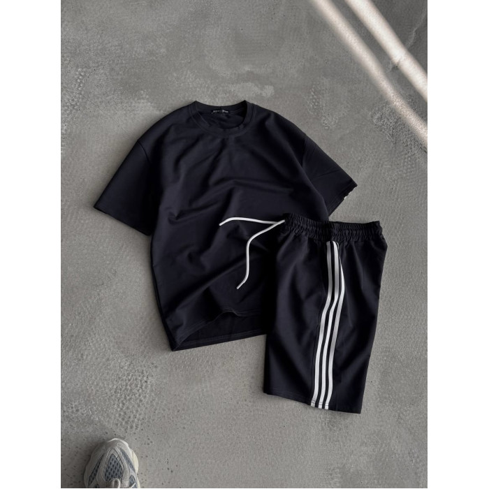 Oversize костюм з акцентними смужками