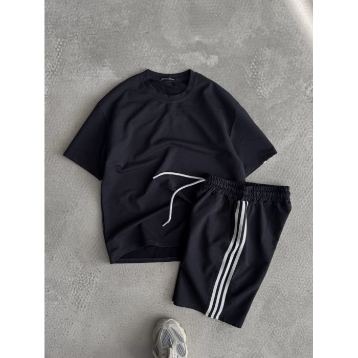 Oversize костюм з акцентними смужками