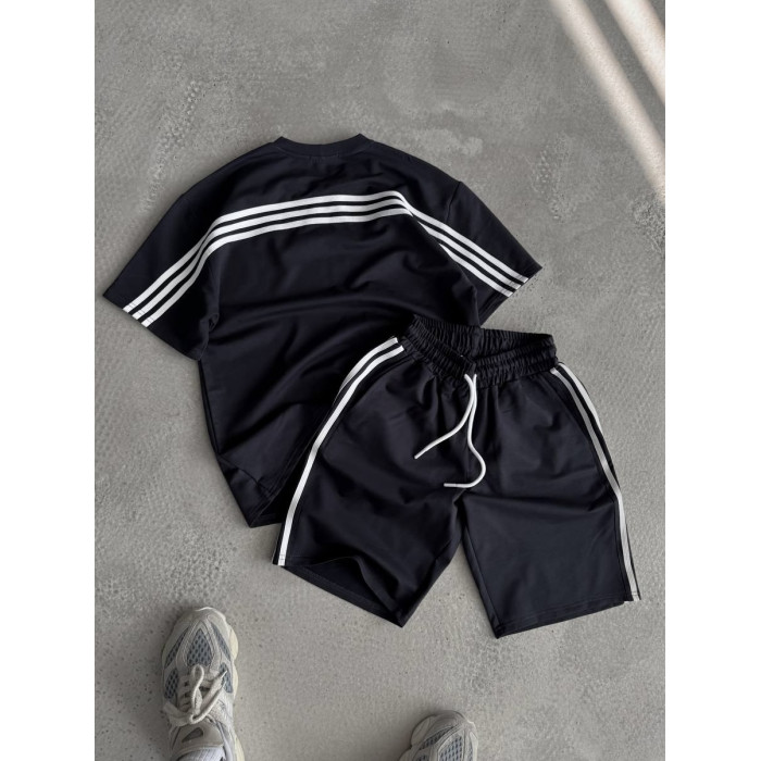 Oversize костюм з акцентними смужками
