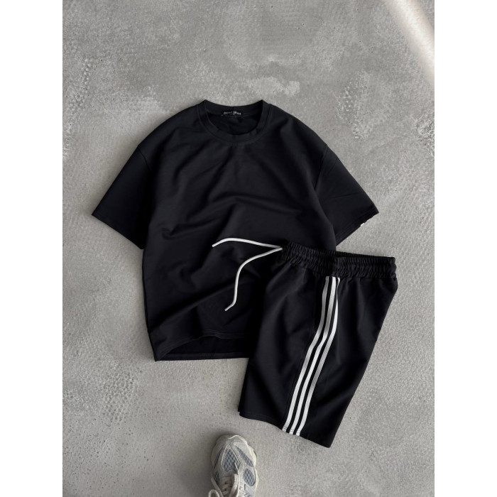 Oversize костюм з акцентними смужками