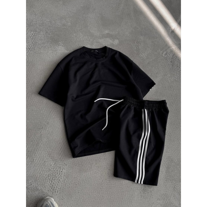 Oversize костюм з акцентними смужками