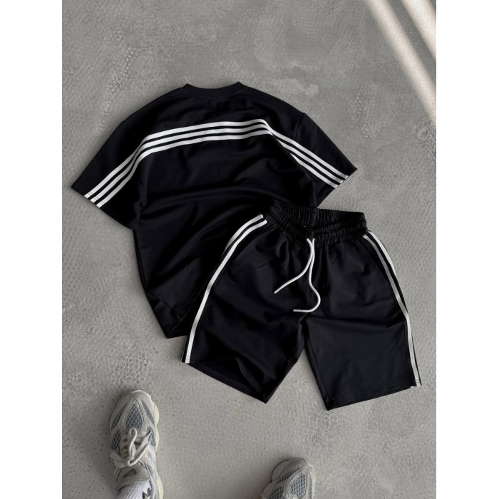 Oversize костюм з акцентними смужками