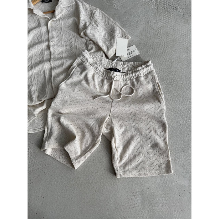 Oversize костюм з фактурної тканини