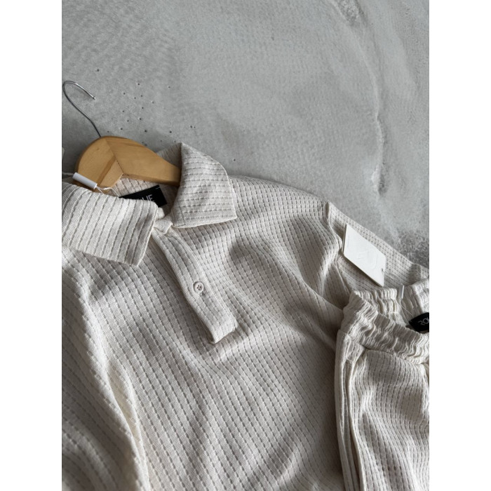 Oversize костюм з фактурної тканини