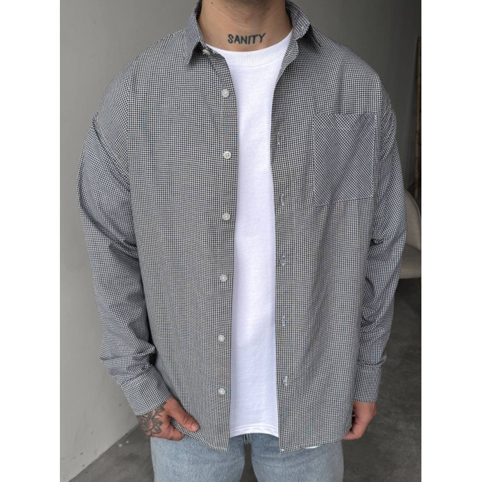 Об'ємна сорочка у мілку клітинку