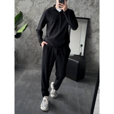 Об'ємний костюм в рубчик