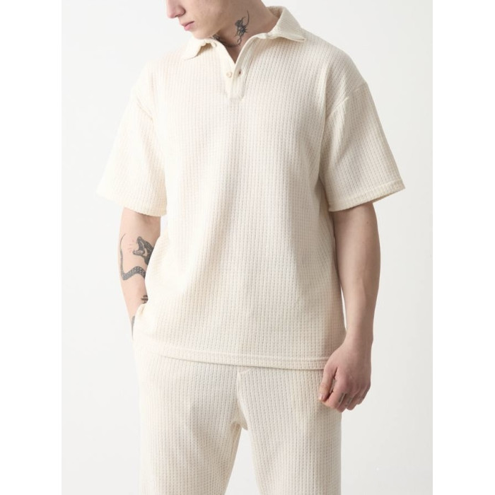 Oversize костюм з фактурної тканини