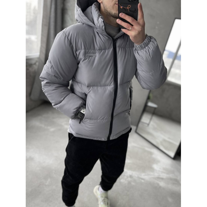 Зимова стьобана куртка